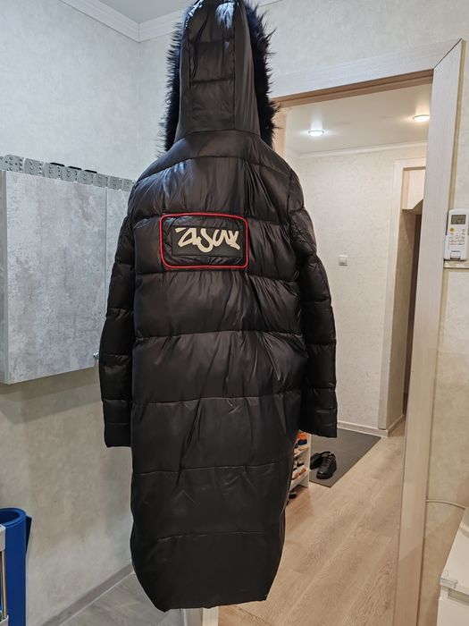 Продам зимний пуховик б/у