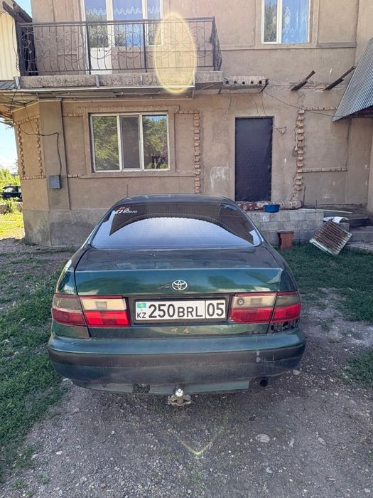 Тайота Карина Е.