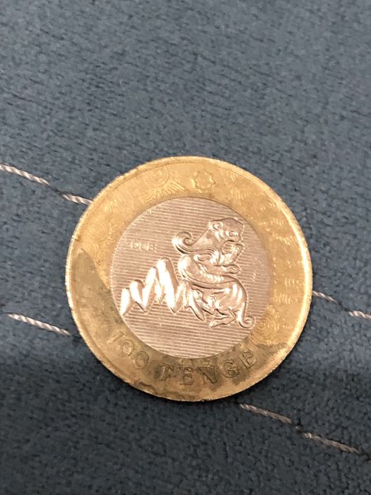 Монета казахстанская саский стиль 100 тенге