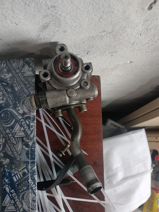 Гур насос на Мазда трибьют