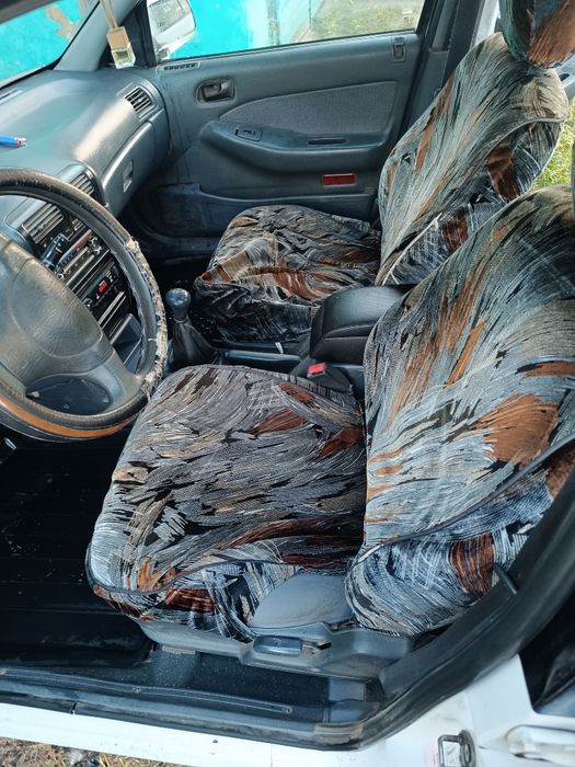 Автомобиль киа сепия