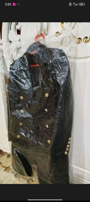 Женский палто ..