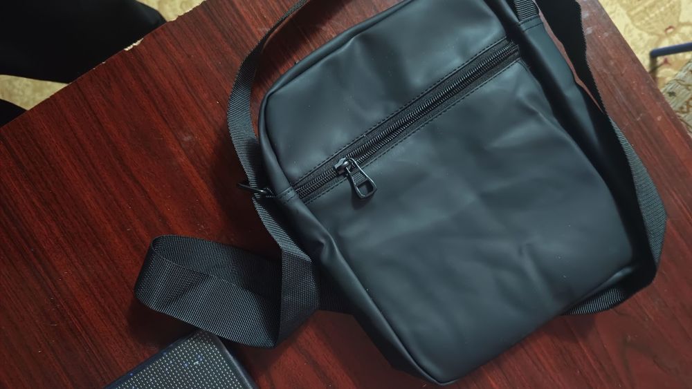 Барсетка новая..