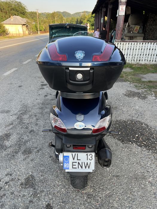 Piaggio mp3 400 LT se conduce cu b