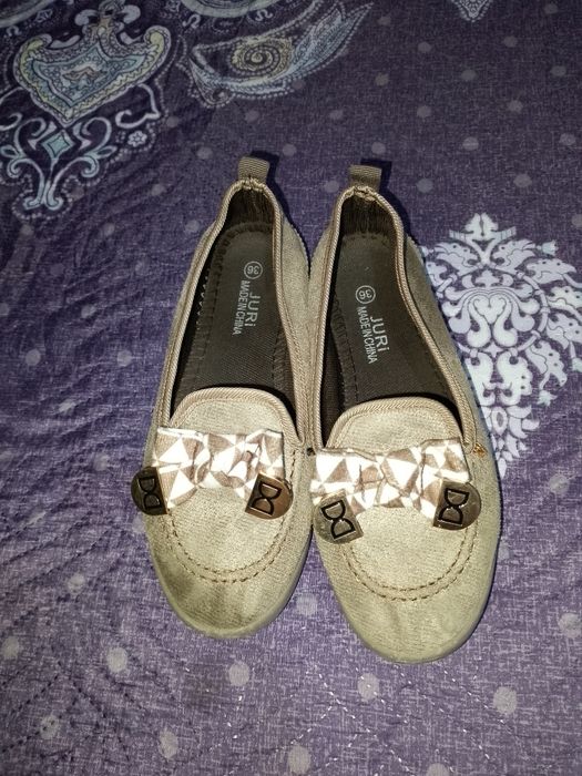 Женская туфелька