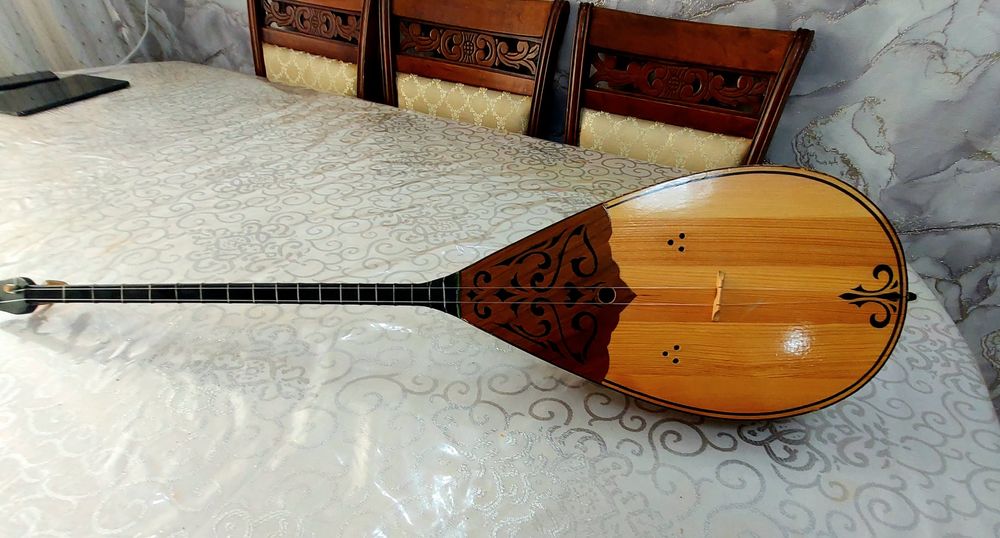 Домбыра кәсіби,үні ашық