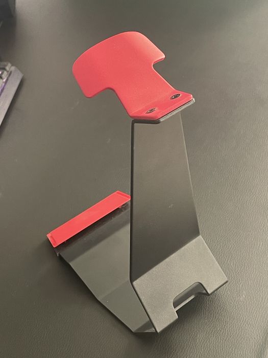 Поставка за слушалки