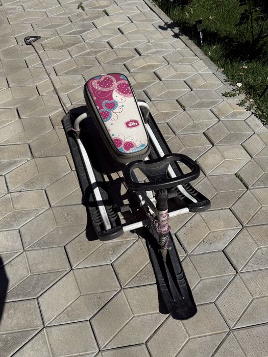 Продам санки с рулем