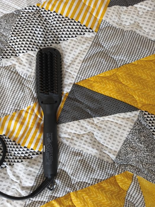 Изправяща четка за коса