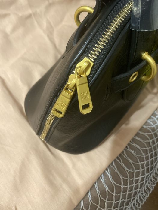 Geanta noua, Miu Miu