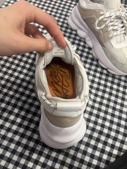 Versace chain reaction