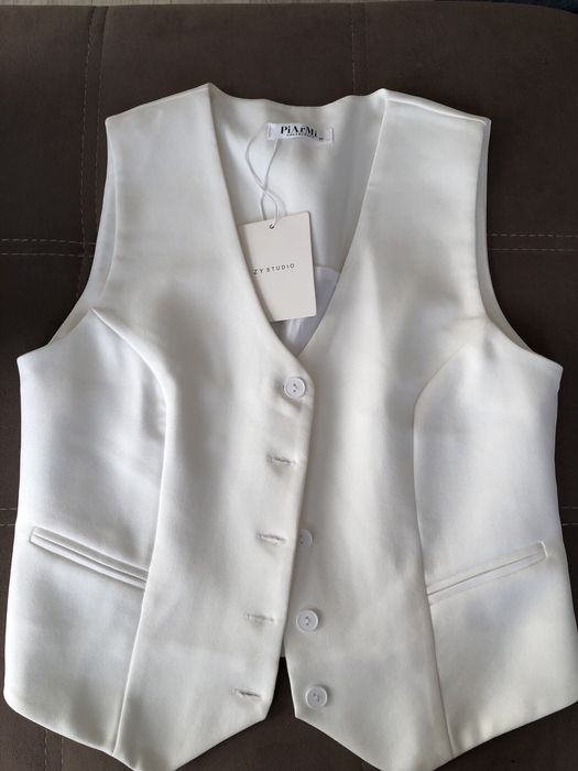 Женская жилетка.