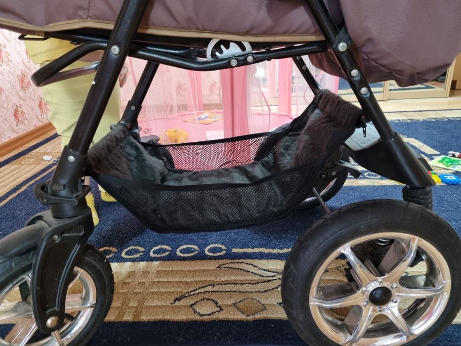 Детская коляска на все сезоны