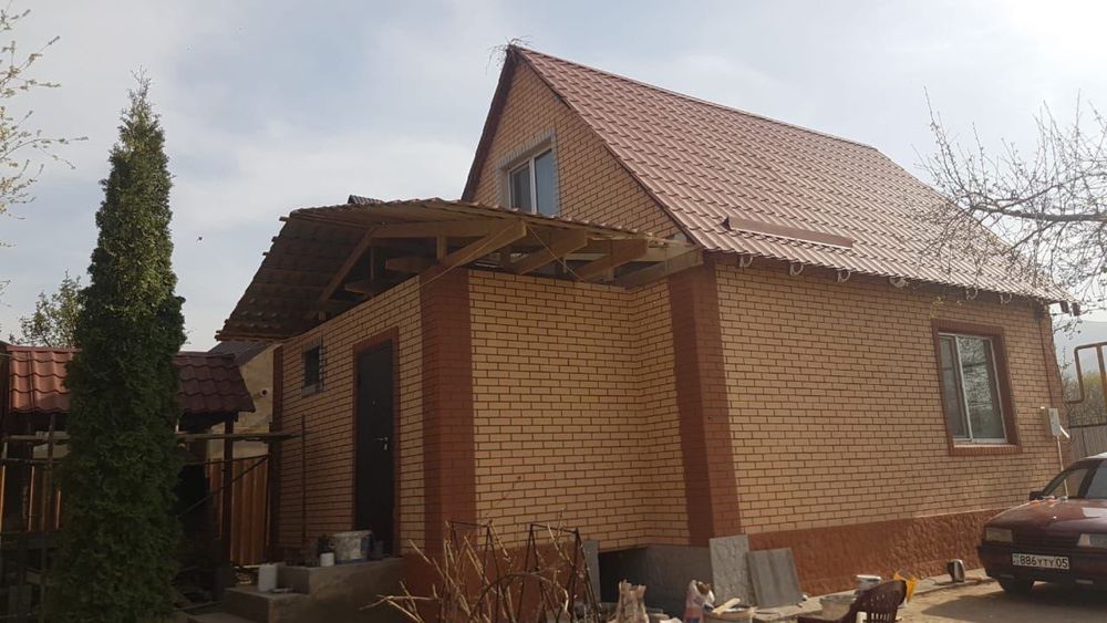 фасадные панели под травертин для вашего дома