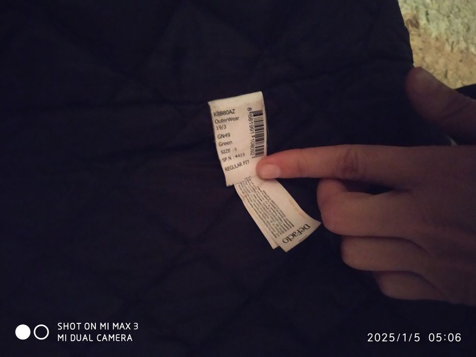 Парка куплена в Defacto