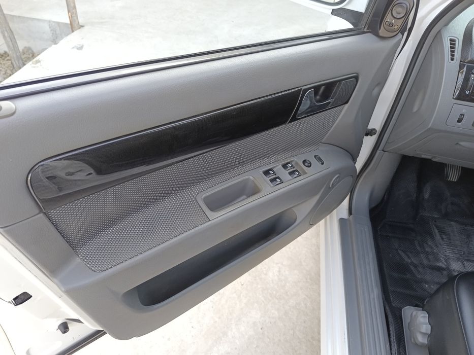 Lasetti 1.8  2011  2-pozitsya