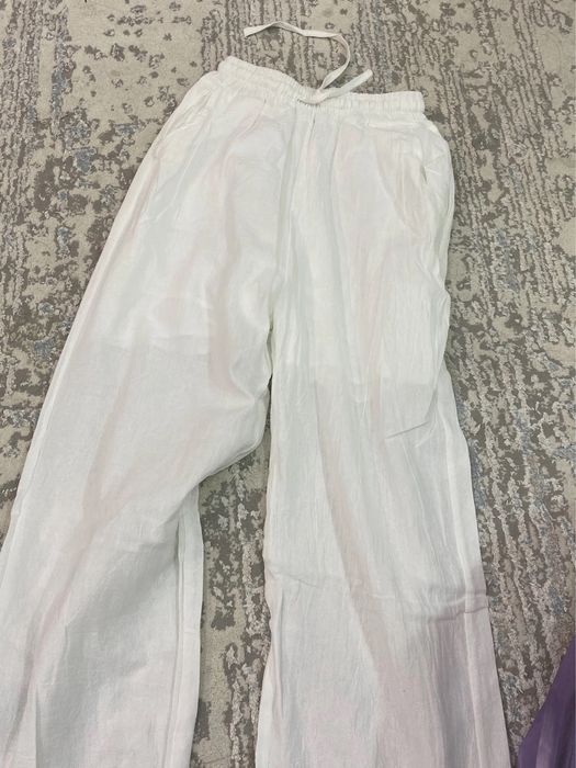 Новые белые брюки