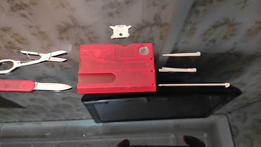 Мультитул по типу Swiss Card(Китай) - ножницы, ручка, фонарь, отвёртка