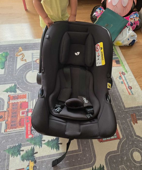 Joie Scoica auto i-Snug 2, utilizata timp de aprox. 6 luni, in stare foarte buna; perfecta pentru bebe pornit la drum