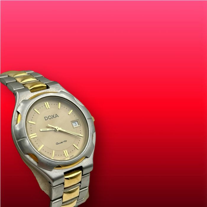 DOXA Quartz – Двутонов швейцарски часовник със златист акцент