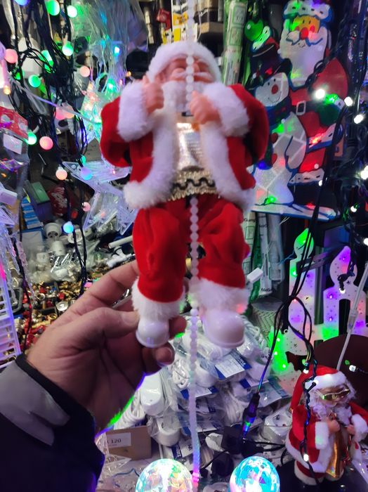 Vând moși Crăciun cățărători și urcători pe scara