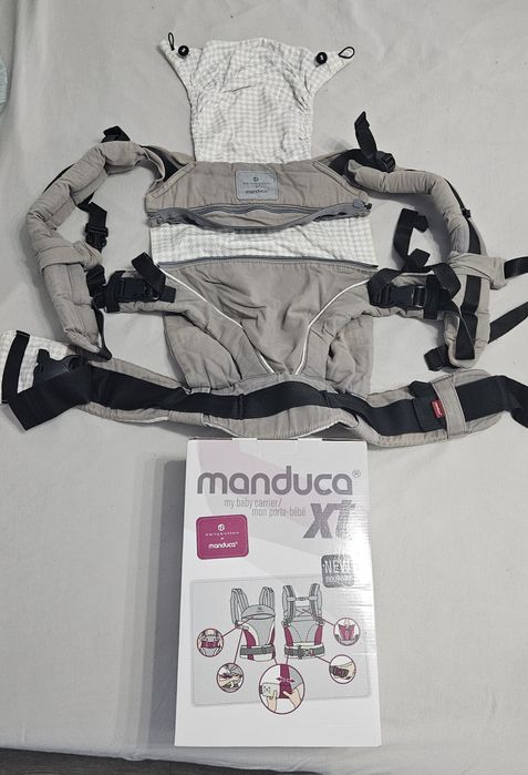 Sistem de purtare MANDUCA XT si protectie impermeabila