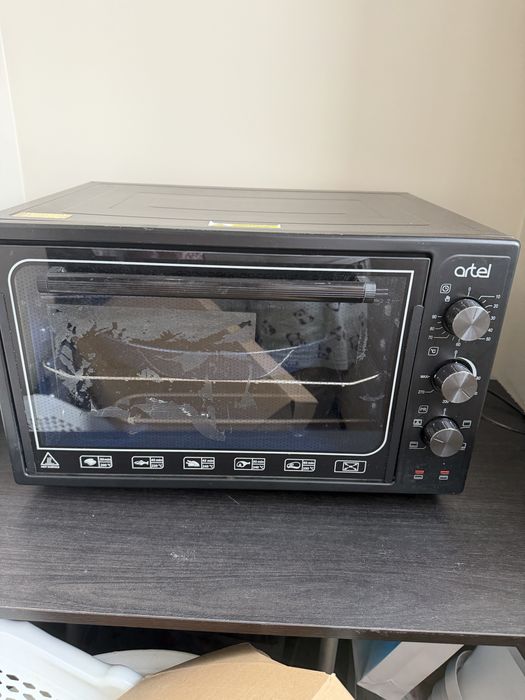 Продам срочно духовку artel