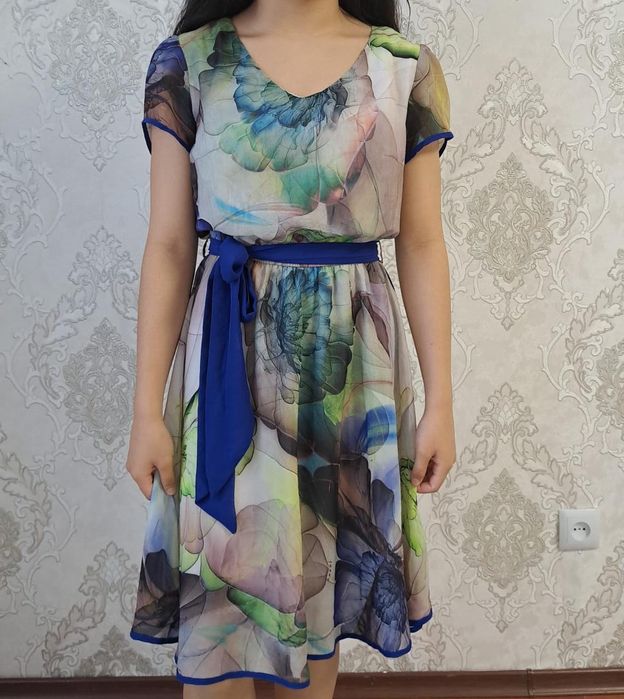 Одежды 42 размера