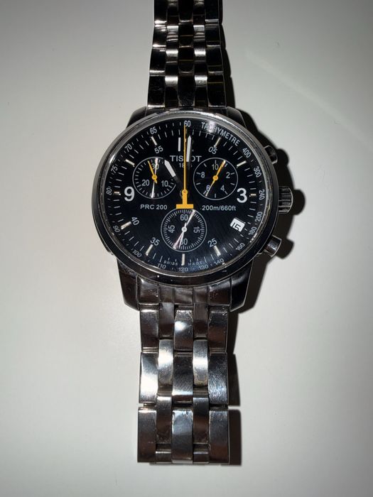 Tissot PRC200 T461, cadran negru, limbi galbene