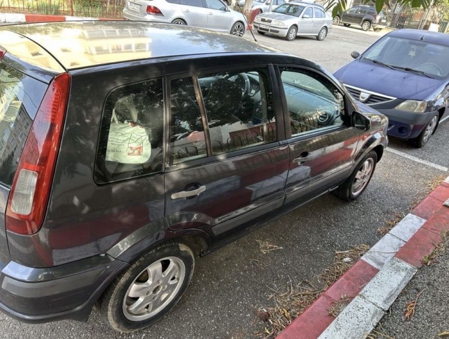 Ford Fusion 1.4 benzina pe gpl nare nici un cu defect accept schimb