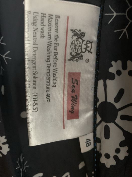 Пуховик зимний с капюшоном 48 разм