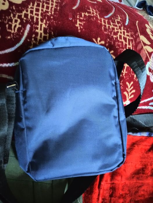 Продам барсетку цвет синий