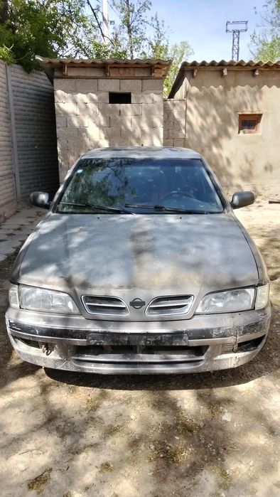 Ниссан Примера P11