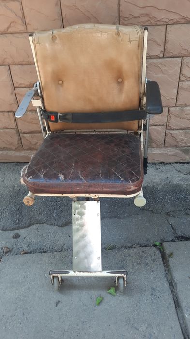 Инвалидная коляска.