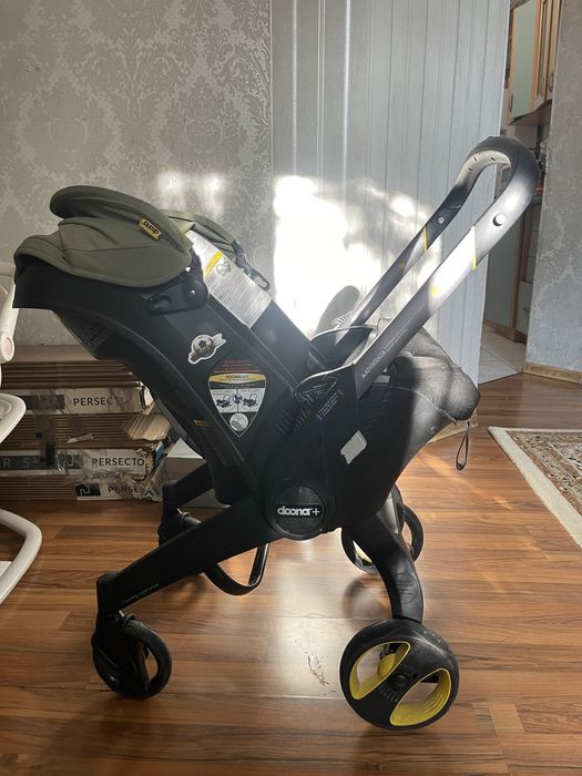 коляска - автокресло с базой DOONA