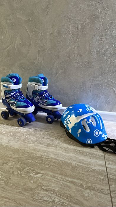 Продам ролики квады со шлемом