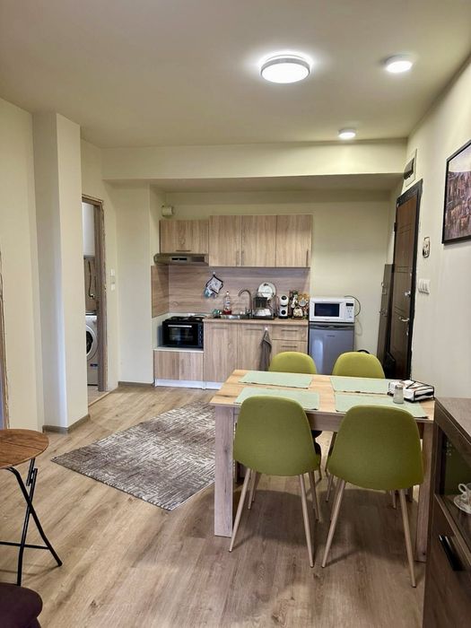 Двустаен обзаведен апартамент за продажба в жилищна сграда в Банско