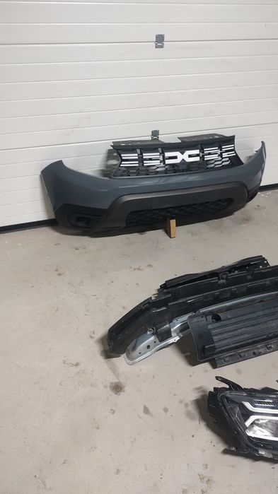 Bara fata , far dreapta, trager , traversa , volet Dacia Duster