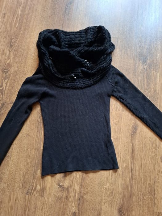 Дамски пуловери .