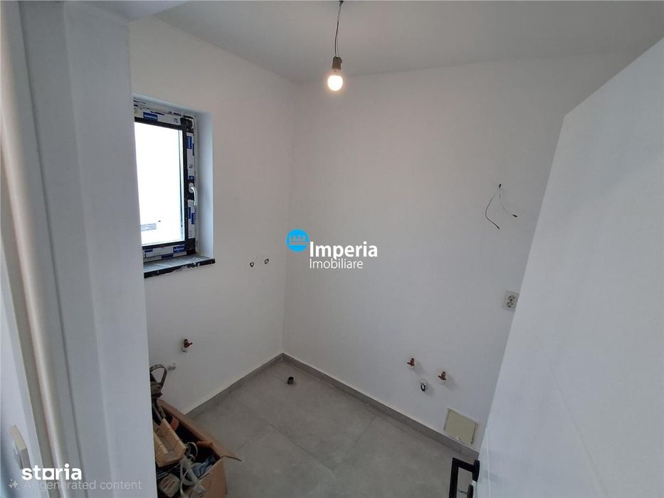 Casa plan parter de vanzare in zona Bucium Visan