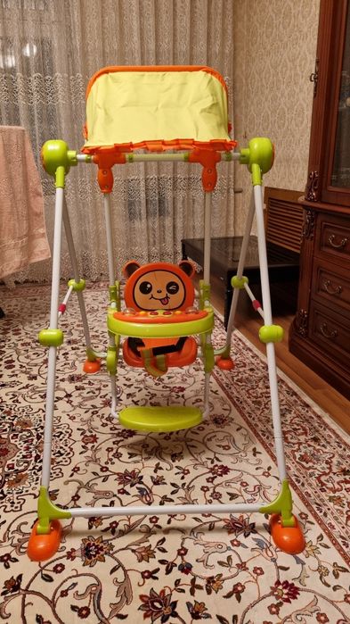 Детская качеля музыкальная