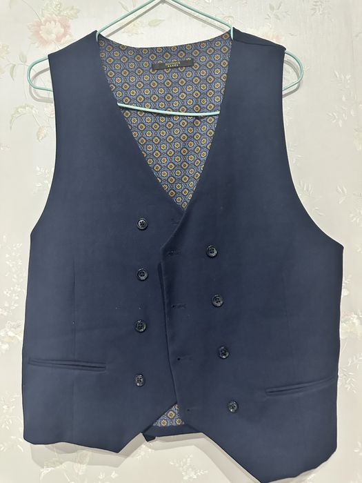 Юбки и жилетки от Massimo dutti