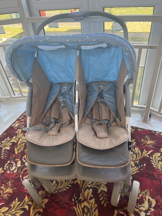 Егиздерге арналган каляска