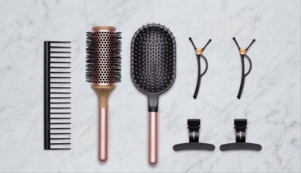 Set de accesorii Dyson pentru coafare.