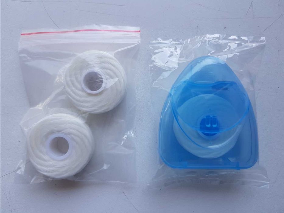 Зубная нить. Нить для чистки зубов. Нитка - зубочистка.