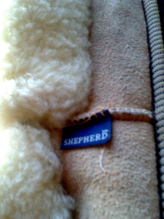 Продам теплые кожаные на меху тапочки