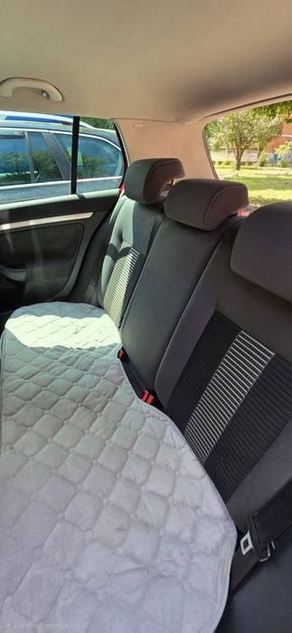 VW Golf 5 UNITED  Roșu 2009 1.9 TDI ,105 CP  3900 E