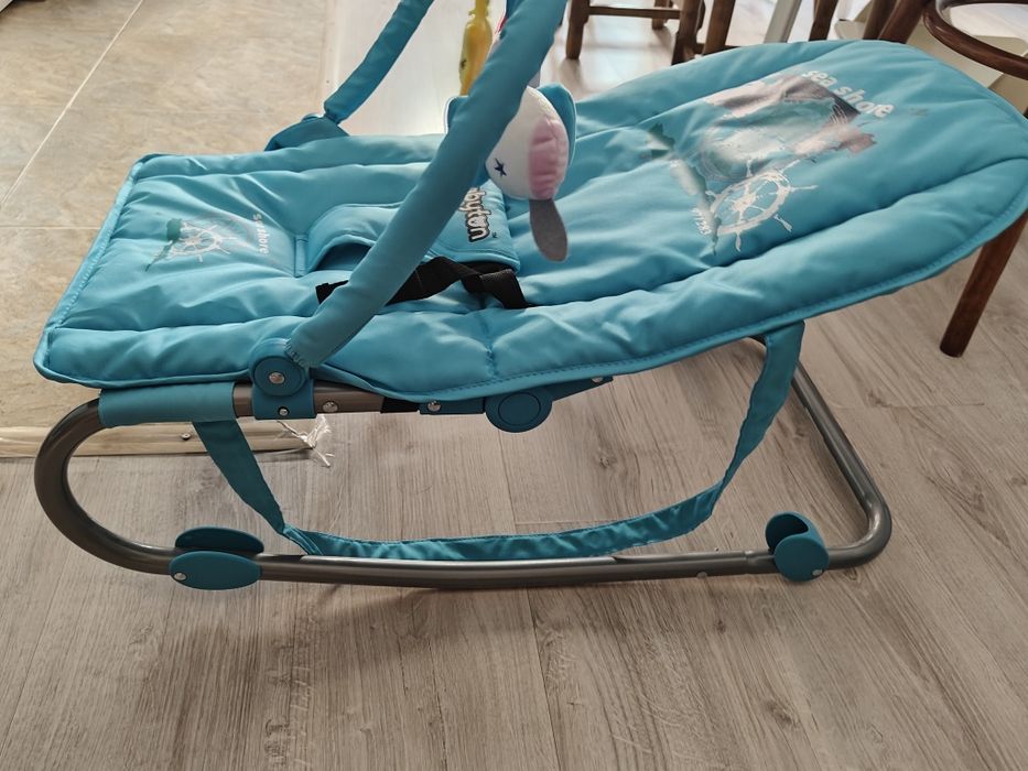 Продам абсолютно новый шезлонг для  малышей