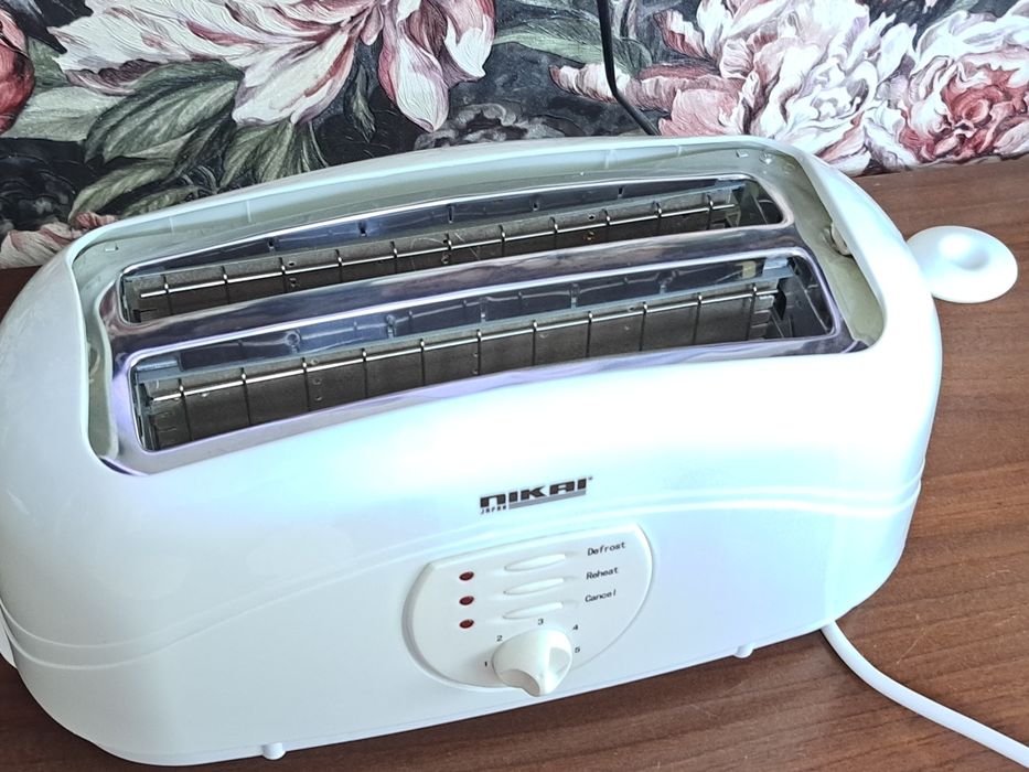Продаётся тостер NIKAI