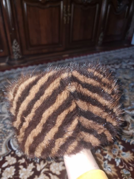 Норка шапка сотилади